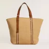 24,7 tote bag van natuurlijk raffia en bruin leer met goudkleurige metalen details