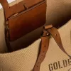 24,7 tote bag van natuurlijk raffia en bruin leer met goudkleurige metalen details