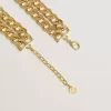Antiek goudkleurige gevlochten ketting met stervormige sluiting.