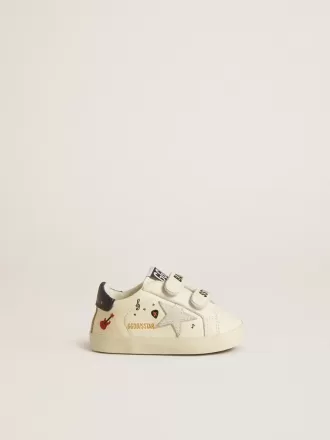 Baby School in nappaleer met muzikale print en witte suède ster