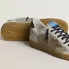 Ball Star LTD met ster van folie-craqueléleer en bruine leren hielband