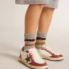 Ball Star Young in nappa met zwarte ster en rode leren inzetstukken