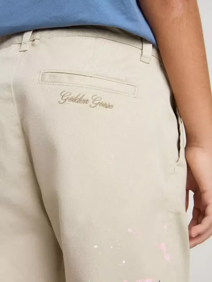 Beige chino broek voor kinderen met veelkleurige spatten
