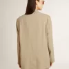 Beige damesjasje met krijtstreep en oversized pasvorm