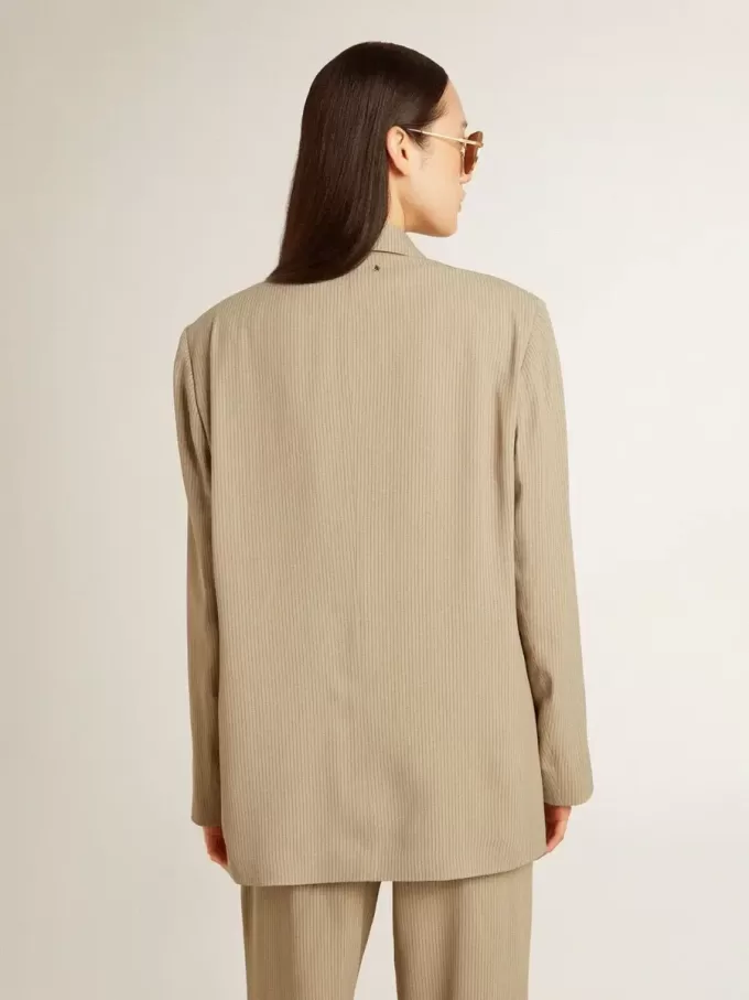 Beige damesjasje met krijtstreep en oversized pasvorm