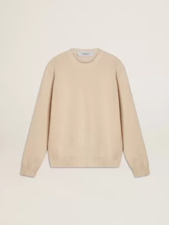 Beige damestrui met ‘Golden’-opschrift op de achterkant