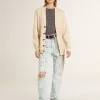 Beige damesvest met ‘Golden’-opschrift op de achterkant