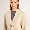 Beige damesvest met ‘Golden’-opschrift op de achterkant