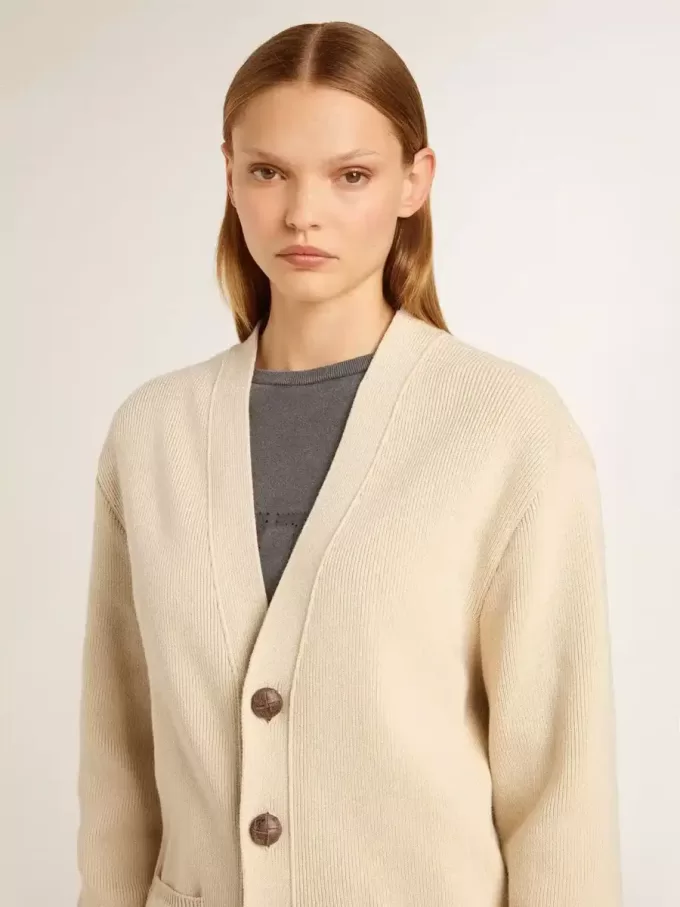 Beige damesvest met ‘Golden’-opschrift op de achterkant