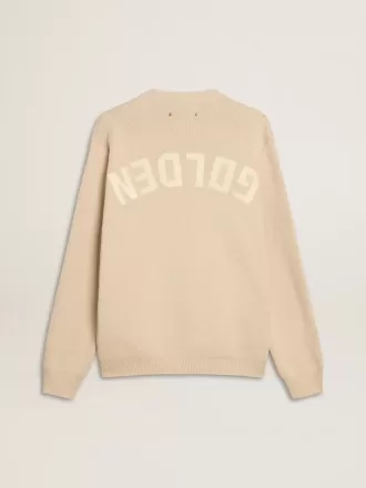 Beige herentrui met ronde hals en ‘Golden’-opschrift op de achterkant.