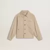 Beige kinderjasje met veelkleurige spatten