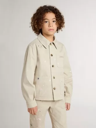 Beige kinderjasje met veelkleurige spatten