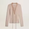 Beige wollen trui met lederen details