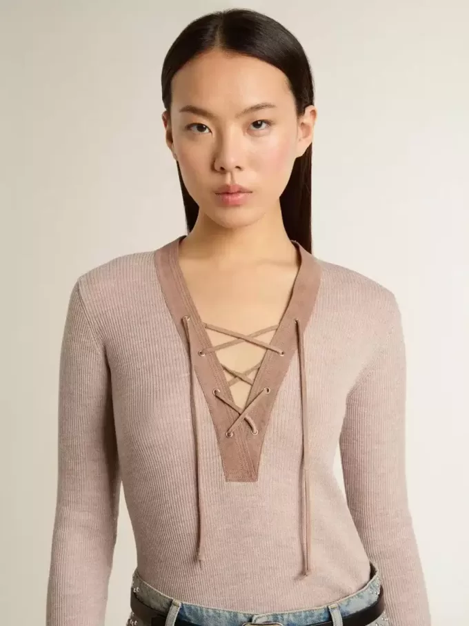 Beige wollen trui met lederen details
