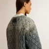 Blauw gewatteerd damesjack van katoenen denim met distressed afwerking