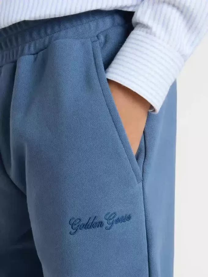 Blauwe joggingbroek voor kinderen met borduursel