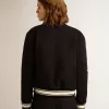 Bomberjack voor dames van donkerblauwe wol met witte details