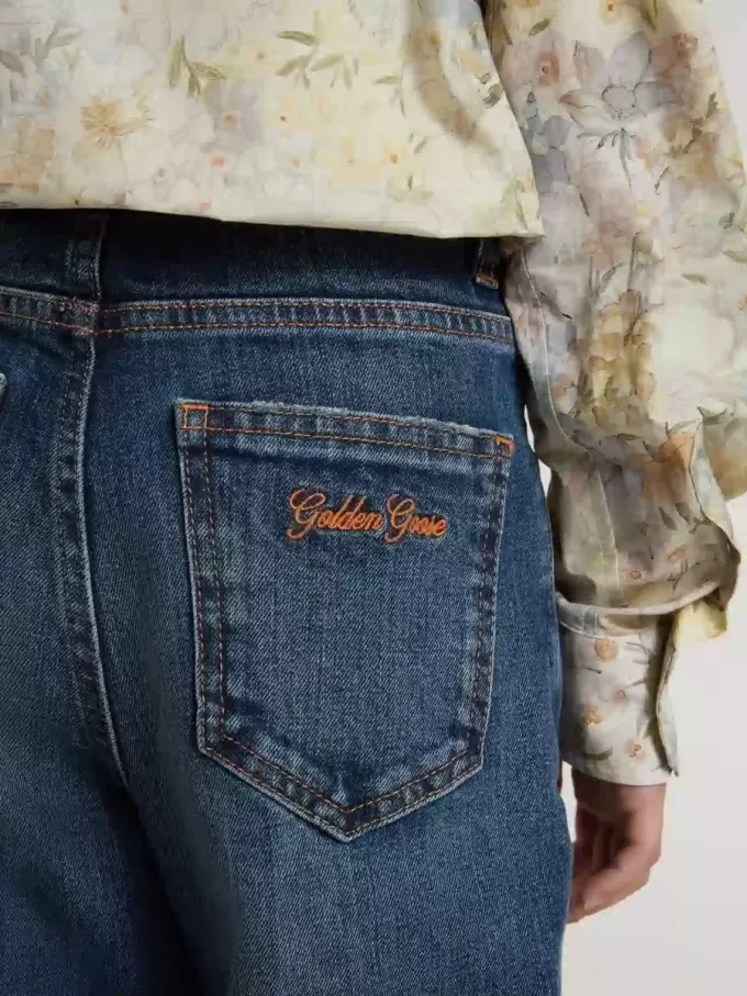 Bootcut jeans voor meisjes met een medium wassing en borduursels