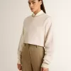 Crèmekleurig katoenen cropped sweatshirt voor dames met kristallen op de voorkant