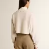 Crèmekleurig katoenen cropped sweatshirt voor dames met kristallen op de voorkant