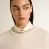 Crèmekleurig katoenen cropped sweatshirt voor dames met kristallen op de voorkant