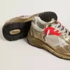 Dad-Star voor dames van mesh en goudkleurig leer met witte leren ster