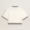 Dames polo shirt in cropped model van versleten wit katoen met blauwe ribboorden