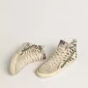 Dames-slip-on van ponyhuid met zebraprint en groene gelamineerde leren details