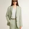 Damesblazer in saliegroene wol