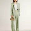 Damesblazer in saliegroene wol