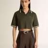 Damescropped polo van militairgroen jersey met borduursel