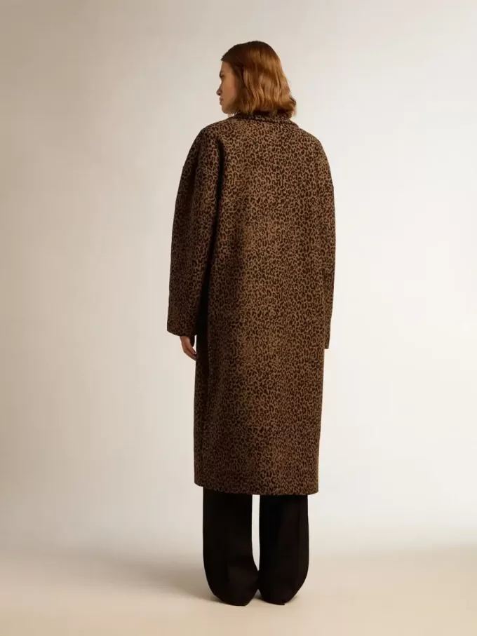 Damesjas met enkele rij knopen van wol met jacquardmotief