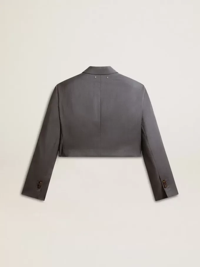 Damesjasje met enkele rij knopen in babyblauwe wol