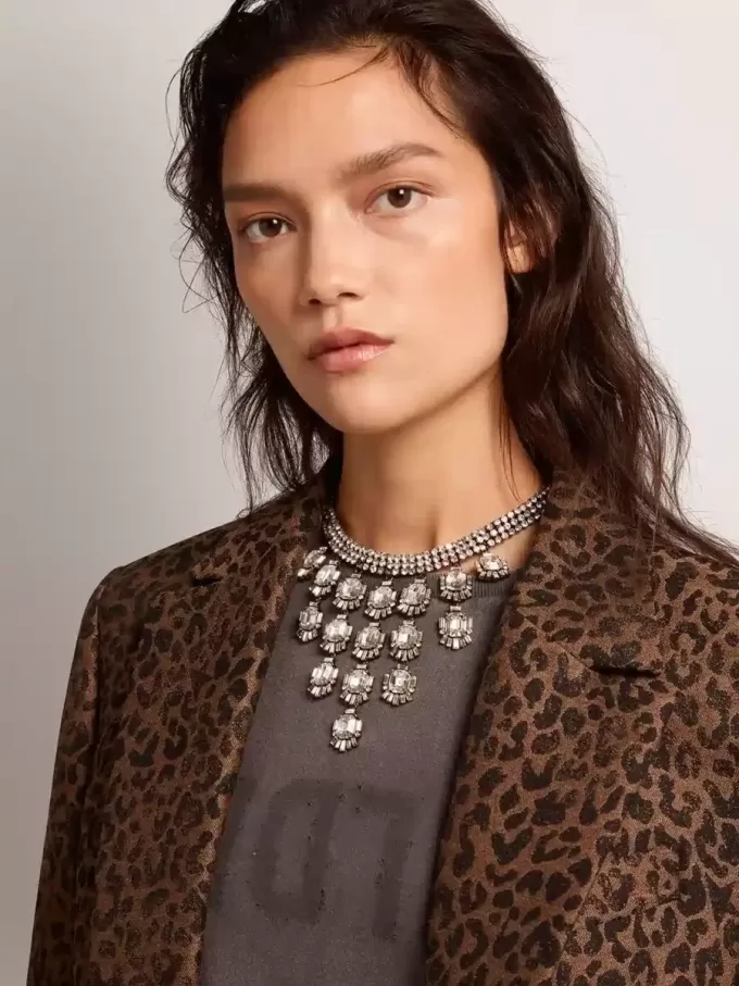 Damesketting in antiek goudkleur met druppelvormige kristallen