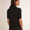Damespoloshirt van marineblauwe merinowol