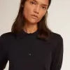 Damespoloshirt van marineblauwe merinowol