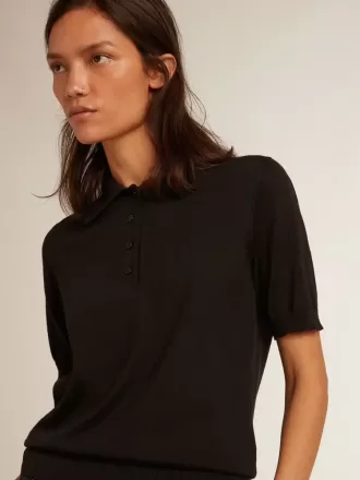 Damespoloshirt van zwarte merinowol