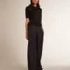 Damespoloshirt van zwarte merinowol