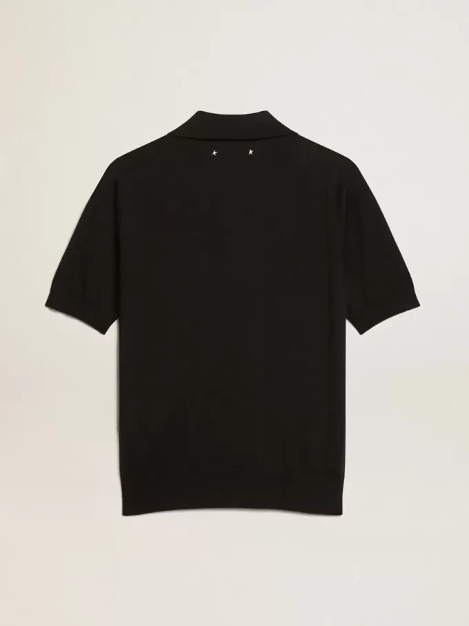 Damespoloshirt van zwarte merinowol