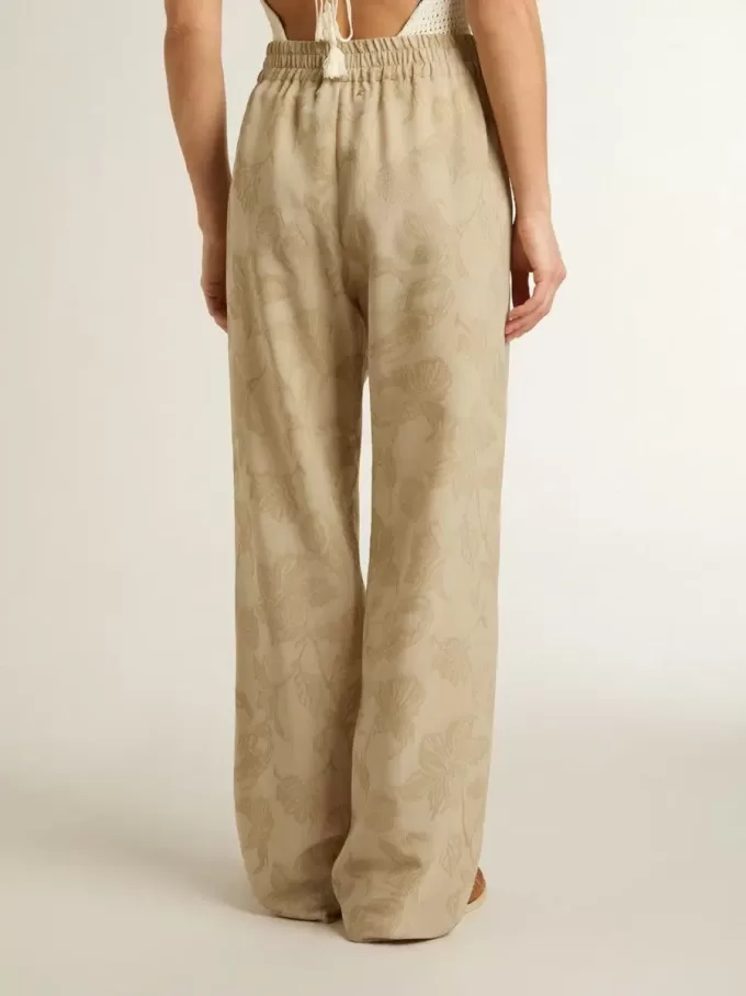 Damespyjamabroek in beige jacquard met bloemenpatroon