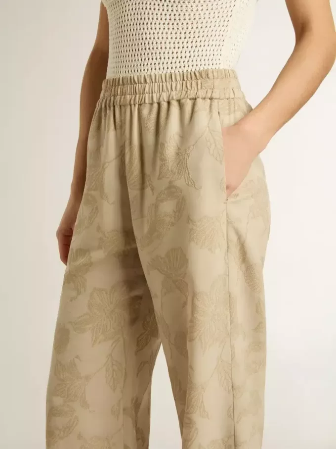 Damespyjamabroek in beige jacquard met bloemenpatroon