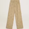 Damespyjamabroek in beige jacquard met bloemenpatroon