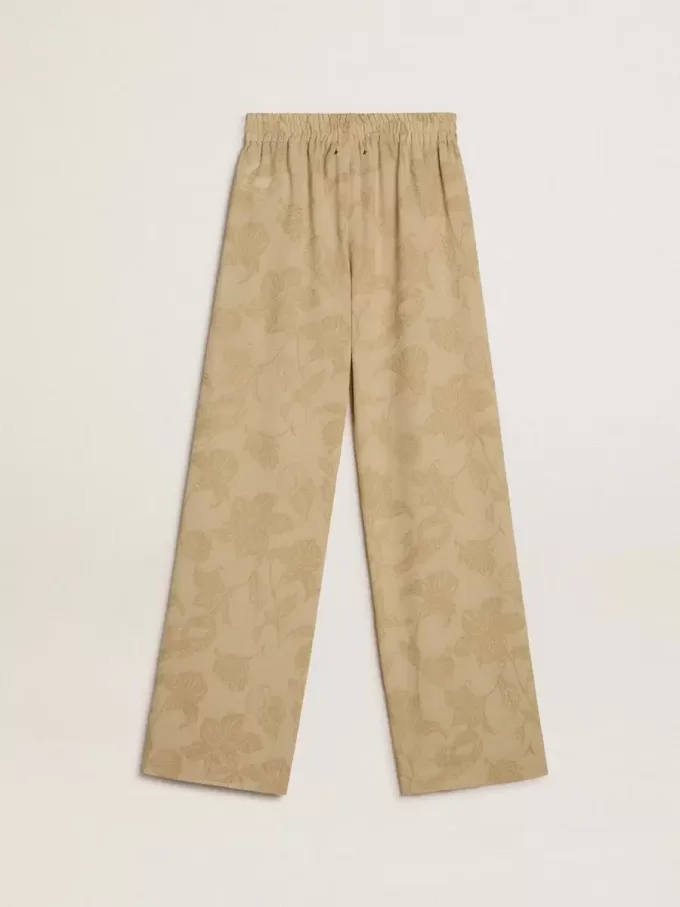 Damespyjamabroek in beige jacquard met bloemenpatroon