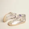 Damesslippers met gelamineerd leren bovenwerk en zilveren glitter