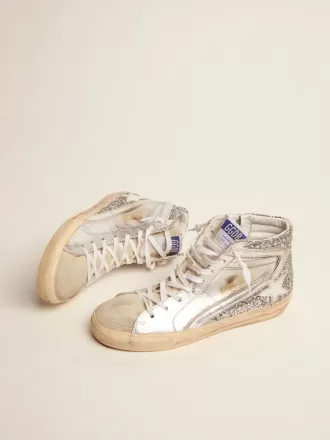 Damesslippers met gelamineerd leren bovenwerk en zilveren glitter