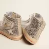 Damesslippers met gelamineerd leren bovenwerk en zilveren glitter