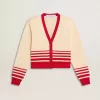 Damesvest in crème met rode strepen