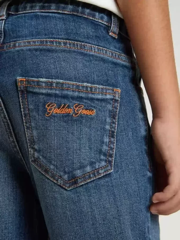 Denim jeans voor jongens met onafgewerkte randen en borduursels