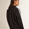 Donkerblauw sweatshirt met ritssluiting, witte streep en contrasterende sterren
