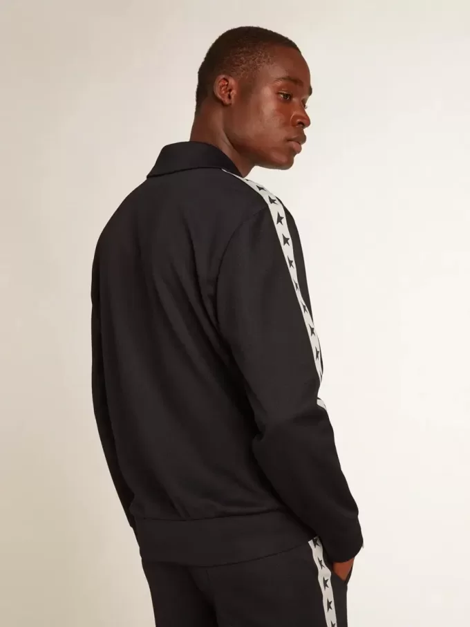 Donkerblauw sweatshirt met witte streep en contrasterende blauwe sterren